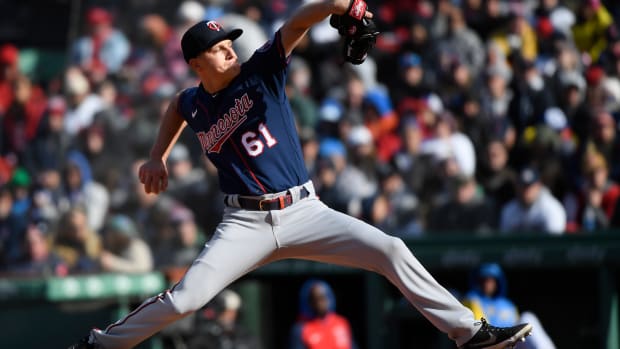 Minnesota Twins relief pitcher Cody Stashak pitches during the eighth inning against the Boston Red Sox at Fenway Park. (2022)